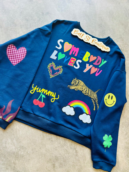 Somebody Loves You Graphic Sweatshirt